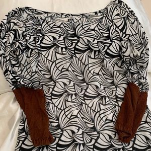 Boho chic long sleeve white, black and brown top.